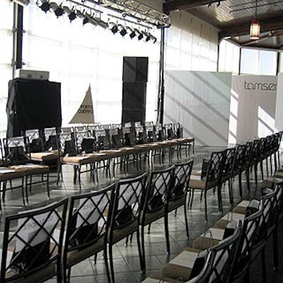 The enclosed terrace of the Lighthouse served as the runway area. Rows of chairs divided into sections named after islands like Capri and St. Tropez were marked with white sail-shaped signs propped on easels.