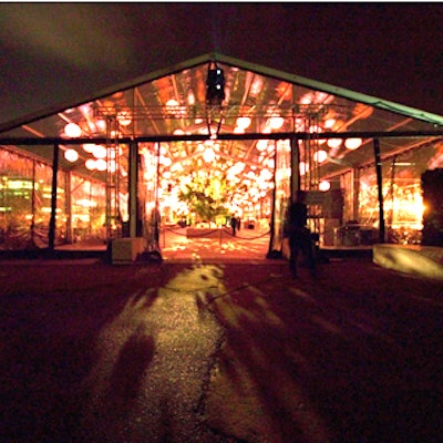 Inside the large tent that covered much of Pier 54, Raul Avila placed blush-colored lanterns. (Photo by Tom Kletecka)