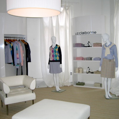 Liz Claiborne displays its clothing in a storelike setup.