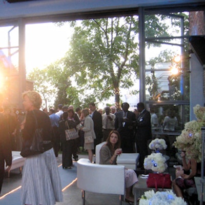 Sky Studios was turned into a chic airplane-theme lounge for Citibank's PremierPass credit card launch. A lit, light blue carpet runner ran through the length of the room mimicking the aisle between seats on an airplane.