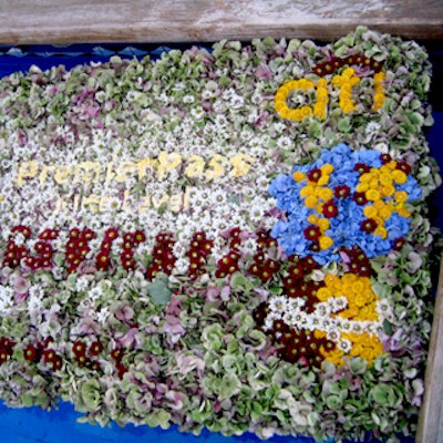 James Francois-Pijuan floral created a giant Citibank credit card out of flowers and floated it in Sky Studio's upstairs pool.