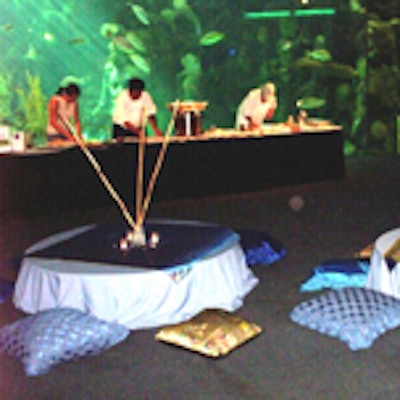 The enormous fish tank provided a scenic backdrop for the chefs and the decor at the Florida Aquarium's Sushi Showdown.