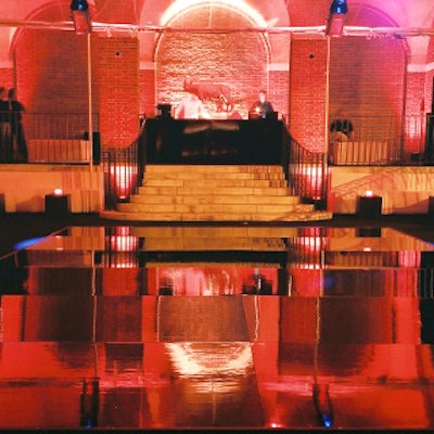 A glossy black dance floor and a clear tent covered the terrace at the Museum of the City of New York's 'New York After Dark' Director's Council summer party at the museum.