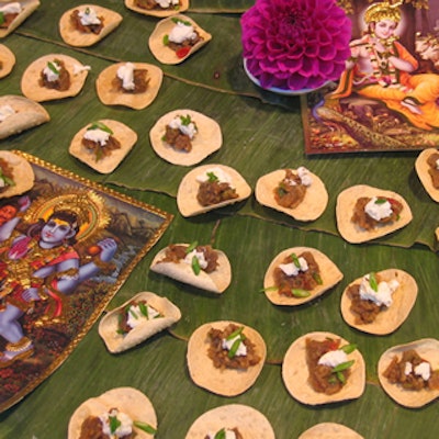 Small chips set atop a banana leaf table treatment were the perfect bite-size treat.