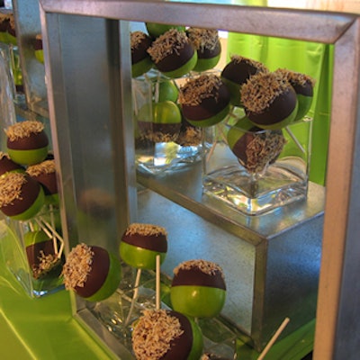 Candy apples with chocolate and sprinkles looked delectable amid steel shadow boxes.