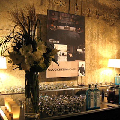 Printed posters and lush florals stood out against the rustic fermentation room.