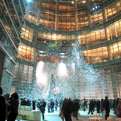 The night ended with the bang of two confetti-filled canons in the courtyard. Isabell's team timed the canons from Jauchem & Meeh to shoot confetti 100 feet high, highlighted by specially programmed lighting units. (Photo courtesy of Robert Isabell Inc.)