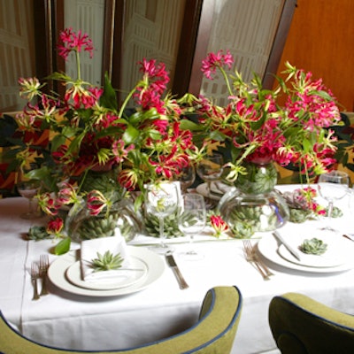 Randi Costa created a bridal shower table with an orchid centerpiece and succulents at each place setting.