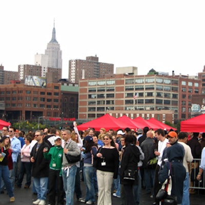 Gray skies and rain didn't discourage a crowd of beer lovers at the first Beer on the Pier festival. Rows of red tenting lined the pier, where over 100 breweries presented more than 200 different beers.