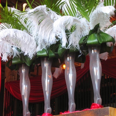 Palm fronds and feathers were presented atop acrylic legs in heels.