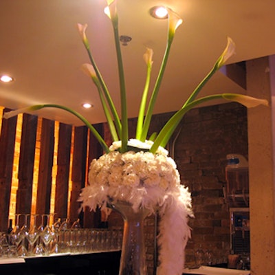 Calla lilies and white feather boas made for a sultry combination.