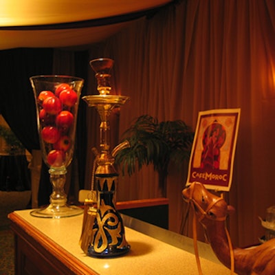Authentic artifacts added dimension to the fully draped space.