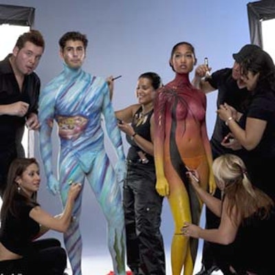 M.A.C. cosmetics created colorful works of art with body paint at the opening of Splashlight Studios in Miami. (Photo by Cliff Howsner)