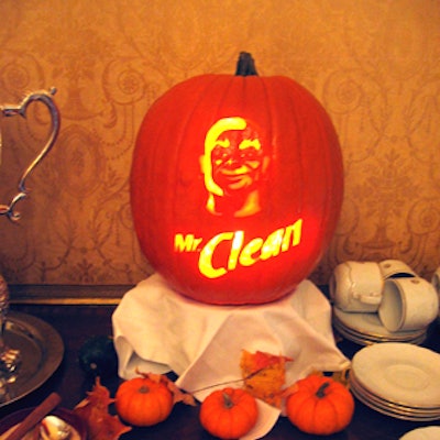 A jack-o'-lantern carved with the Mr. Clean logo made for fall decor and bold branding.