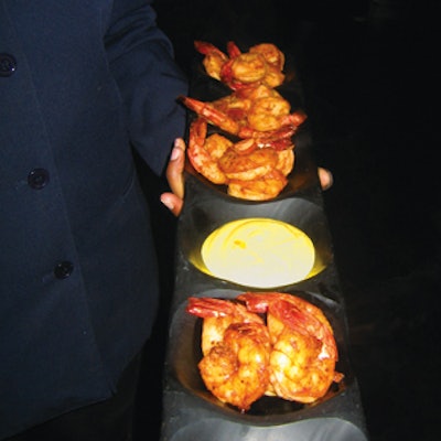 Among Restaurant Associates' passed hors d'oeuvres were fire-roasted shrimp with saffron aioli.