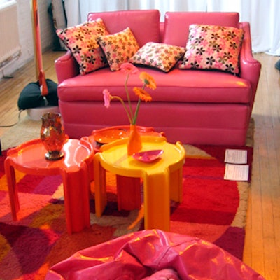 Event designer Jes Gordon created several different vignettes to flaunt each separate decade's design trend—including flowers, furniture, and food.