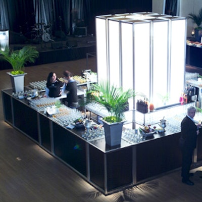 Illuminated bar area sets the tone for the black and white event.