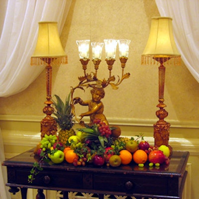 Ornate candle lamps displayed on tables functioned as room decor.