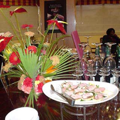 Chilled medallions of roast duck from Sheffield's Restaurant were served. Simple floral centerpieces from Art of Flowers decorated the tables.