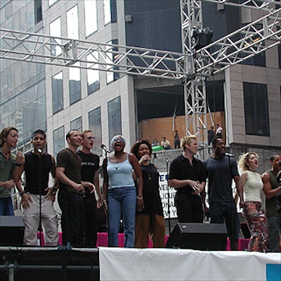 The cast of Rent sang the show's song 'Seasons of Love' on a stage by Mountain Productions Inc.