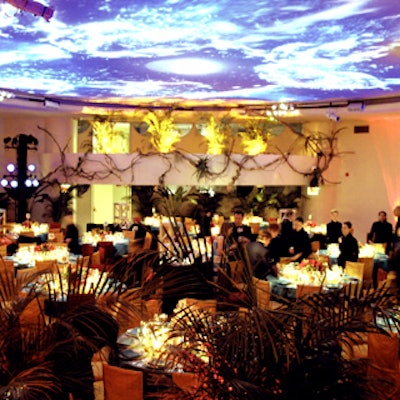 Reminiscent of sites of Aztec ruins, the dining area had vines and tropical plants billowing over its balcony and lining the perimeter of the room. (Photo: Virginie Blachere/Solomon R. Guggenheim Foundation)