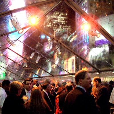 For a party celebrating 100 years of Times Square, a clear tent on the sidewalk in front of the Marriott Marquis allowed guests to see the glittering lights of the square during cocktails.