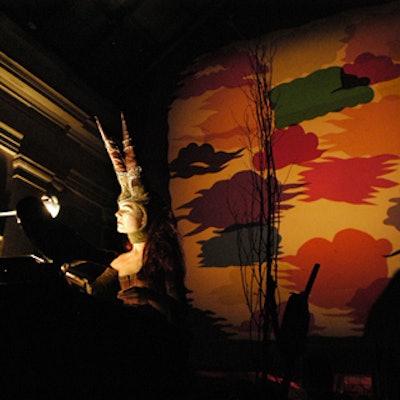 Artist Shary Boyle's drawings of scenes from the Grimm Brothers' darkest tales were projected on the walls to add to the spooky ambiance.