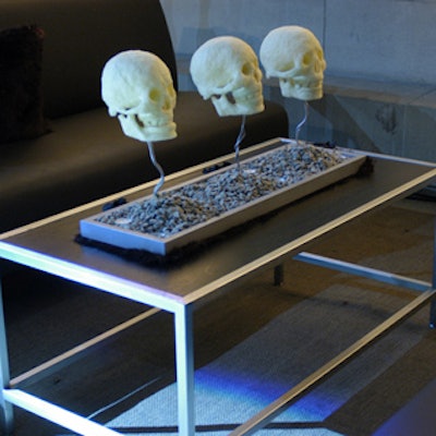 Sculptor Marcello Dalmao's skull-shaped candles enhanced the creepy atmosphere at the benefit.