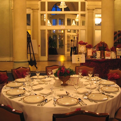 Dining tables were simple and elegant and the centrepieces were auctioned off.