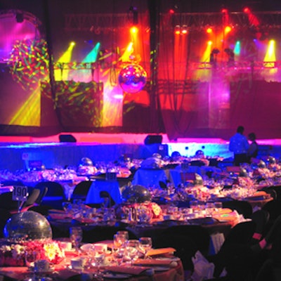 The 'Playboy Club,' decorated with mirror balls and disco lighting, included a runway for a celebrity fashion show at the Bell Mobility Mirror Ball celebrity gala for Sick Kids hospital at the Metro Toronto Convention Centre.