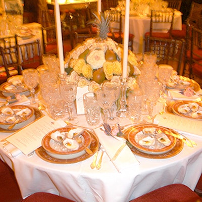 Aisling Flowers designed centerpieces that incorporated pears and pineapples.
