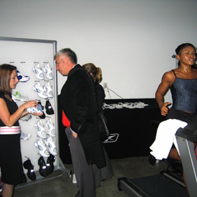 In one corner of the room, guests could try on the different models of the Pump shoes. Prisila Jacobs, a master trainer at the Reebok Sports Club, demonstrated the shoe's serious athletic design by running on a treadmill for three straight hours.