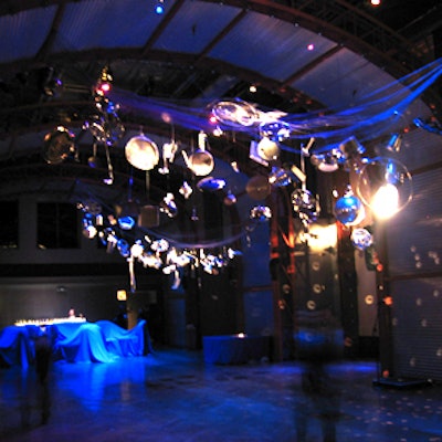 Before the performance, Great Performances served cocktails in BAM’s LePercq Space, which was darkened for a theatrical effect with a collection of shiny objects suspended from the ceiling.