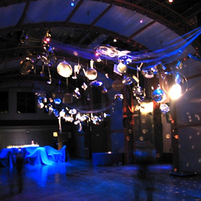 Before the performance, Great Performances served cocktails in BAM’s LePercq Space, which was darkened for a theatrical effect with a collection of shiny objects suspended from the ceiling.