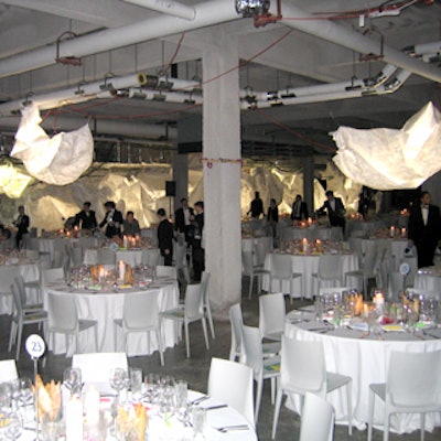 Architect and event designer Christian Wassmann used nontraditional materials like Tyvek to create these billowing cloudlike chandeliers.