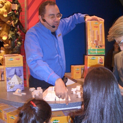 An FAO Schwarz employee entertained kids and parents with a toy demonstration.