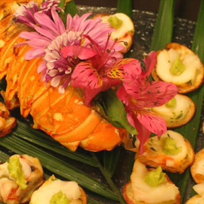 Hors d'oeuvres included lobster medallions on golden herbed potato rounds.