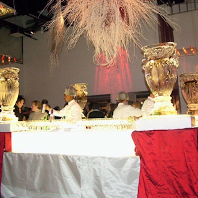 Okamoto Studio created four large pillar-like ice sculptures that bordered a central bar.