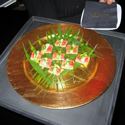 Abigail Kirsch's catering for the event included peppered sirloin of beef with caramelized onion jam and horseradish arugula sauce.