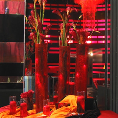 Cocktail rooms were decorated in warm hues and with large floral arrangements.