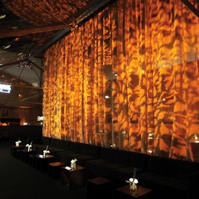 In the tent, orange-toned projections subtly echoed the Polynesian theme.