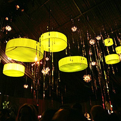 Thomas Ford designed a 30-foot lighting fixture composed of 10 chartreuse-colored floating discs, 30 crystal chandeliers, 600 water-filled glass orbs, and 500 icicle-shaped mirrors.