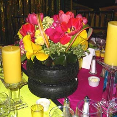 Instead of vases, flowers were arranged in tires.