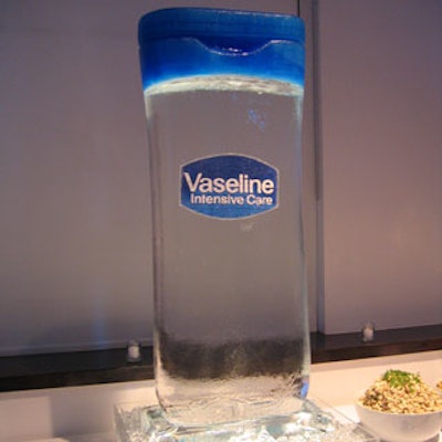 A giant ice sculpture of a bottle of Vaseline anchored the buffet table.