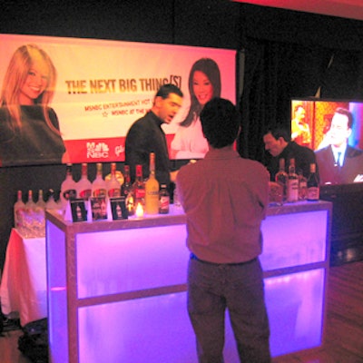 MSNBC’s launch party for new entertainment shows MSNBC Entertainment Hot List and MSNBC at the Movies at the Gibson Guitar Entertainment Showroom had red lighting and ultraviolet backlit bars.