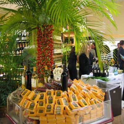 A palm tree filled with tomato, mozzarella, and basil skewers accented a cheese display.