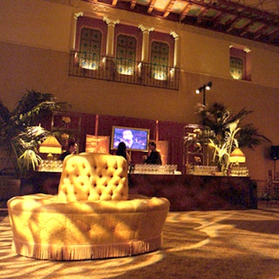 Lighting in decorative Moroccan patterns illuminated the venue's tile floor, and seating was plush and loungey.
