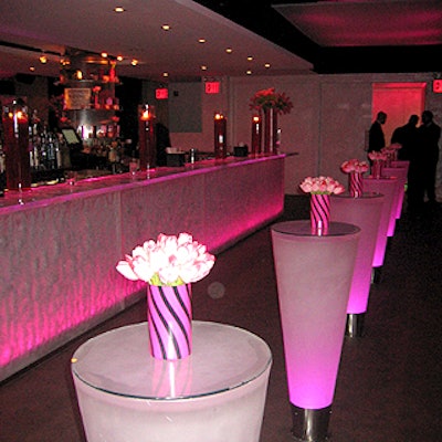 Black and pink wrapped vases matched the perfume bottle.