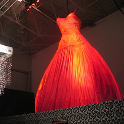 The 30-foot 'Big Frock'-a giant dress with a concept living space at its base-was unveiled at the opening-night gala of the Interior Design Show at the National Trade Centre.
