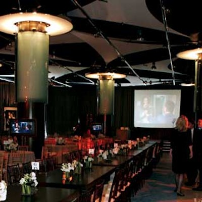 Abundant plasma screen televisions played a reel of Miramax films.